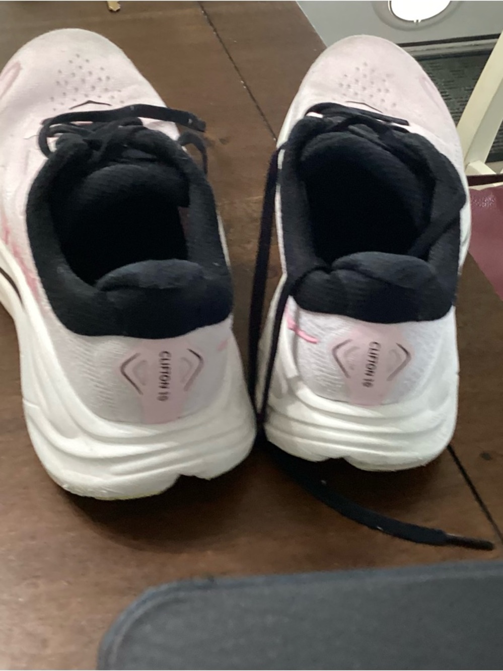 White and Light Pink Cushioned Athletic shoe